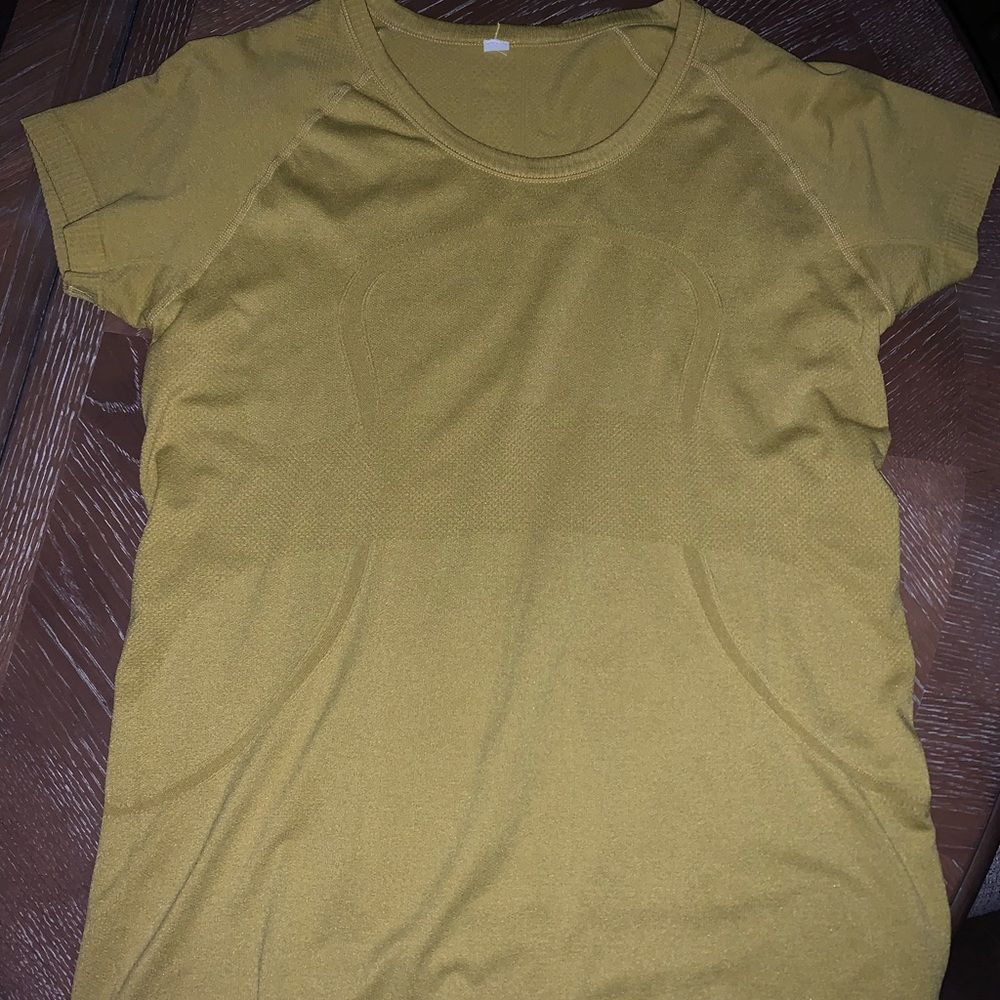 LULULEMON size 10 swiftly tech.